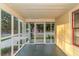 Screened porch with view of street and landscaping at 1068 N Main Nw St, Conyers, GA 30012
