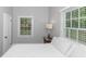 Bright bedroom featuring a queen-size bed and large windows at 1068 N Main Nw St, Conyers, GA 30012