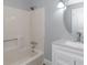 Clean bathroom with a tub, shower, and vanity at 1068 N Main Nw St, Conyers, GA 30012