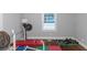 Dedicated home gym with weights and workout mats at 1068 N Main Nw St, Conyers, GA 30012
