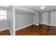 Bright bedroom with hardwood floors and ample closet space at 1068 N Main Nw St, Conyers, GA 30012