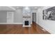 Hardwood floors, fireplace, and an open floor plan at 1068 N Main Nw St, Conyers, GA 30012