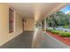 Front porch with columns and American flag at 1068 N Main Nw St, Conyers, GA 30012