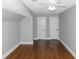 Spacious bedroom with hardwood floors and two closets at 1068 N Main Nw St, Conyers, GA 30012