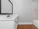 Bathroom with white vanity, quartz countertop and bathtub at 1068 N Main Nw St, Conyers, GA 30012