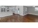 White shaker cabinets, stainless steel appliances, and island at 1068 N Main Nw St, Conyers, GA 30012