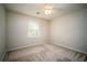 Well-lit bedroom with neutral walls and carpeting at 1080 Chestnut Hill Sw Cir, Marietta, GA 30064