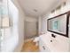 Updated bathroom with walk-in shower and modern vanity at 5332 Zachary Dr, Stone Mountain, GA 30083