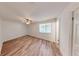 Large bedroom with hardwood floors and ceiling fan at 5332 Zachary Dr, Stone Mountain, GA 30083