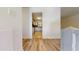 Bright hallway with light flooring and view to kitchen at 5332 Zachary Dr, Stone Mountain, GA 30083