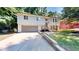House exterior featuring a gray color scheme and landscaping at 5332 Zachary Dr, Stone Mountain, GA 30083