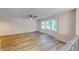 Living room with bay window and hardwood flooring at 5332 Zachary Dr, Stone Mountain, GA 30083