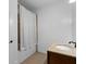 Simple bathroom with tub, shower, and granite vanity at 6159 Fernstone Nw Ct, Acworth, GA 30101