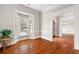 Spacious dining room with hardwood floors, bay window, and crown molding at 6159 Fernstone Nw Ct, Acworth, GA 30101
