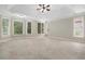 Large main bedroom with hardwood floors and abundant natural light at 6159 Fernstone Nw Ct, Acworth, GA 30101