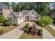Beautiful home on a tree-lined street with a large driveway at 6159 Fernstone Nw Ct, Acworth, GA 30101