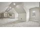 Large bonus room with window and vaulted ceiling at 6159 Fernstone Nw Ct, Acworth, GA 30101