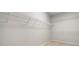 Spacious walk-in closet with ample shelving at 6159 Fernstone Nw Ct, Acworth, GA 30101