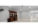 Finished basement room with built-in cabinetry and access to other rooms at 6159 Fernstone Nw Ct, Acworth, GA 30101