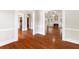 Open living room with hardwood floors and views to other rooms at 6159 Fernstone Nw Ct, Acworth, GA 30101