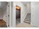 Unfinished basement with staircase and additional storage space at 6159 Fernstone Nw Ct, Acworth, GA 30101