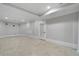 Finished basement with tile flooring and recessed lighting at 6159 Fernstone Nw Ct, Acworth, GA 30101