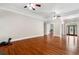 Bright living room with hardwood floors, fireplace, and high ceilings at 6159 Fernstone Nw Ct, Acworth, GA 30101