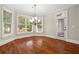 Bright dining room with hardwood floors and a chandelier at 6159 Fernstone Nw Ct, Acworth, GA 30101