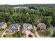 Aerial view of a luxury home community with lush greenery at 6159 Fernstone Nw Ct, Acworth, GA 30101