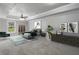 Large main bedroom with modern decor and natural light at 6159 Fernstone Nw Ct, Acworth, GA 30101