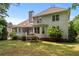 Spacious backyard with deck and lush green landscaping at 6159 Fernstone Nw Ct, Acworth, GA 30101
