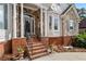 Inviting front entry with brick steps, stone columns and a double door at 6159 Fernstone Nw Ct, Acworth, GA 30101