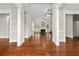 Spacious living room featuring hardwood floors, fireplace, and high ceilings at 6159 Fernstone Nw Ct, Acworth, GA 30101