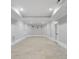 Spacious finished basement with recessed lighting and tile flooring at 6159 Fernstone Nw Ct, Acworth, GA 30101