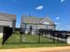 Private backyard with a fenced area and lawn at 499 Godfrey Dr, Cumming, GA 30040