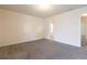 Spacious bedroom with grey carpeting and access to bathroom at 3139 Redwood Run, Atlanta, GA 30349