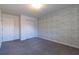 Bedroom with grey carpet and double doors at 3139 Redwood Run, Atlanta, GA 30349