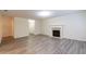 Spacious living room with fireplace and vinyl flooring at 3139 Redwood Run, Atlanta, GA 30349