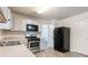 Modern kitchen with stainless steel appliances and light cabinets at 3139 Redwood Run, Atlanta, GA 30349