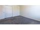 Bedroom with double closet and grey carpeting at 3139 Redwood Run, Atlanta, GA 30349