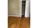 Bedroom with hardwood floors and bifold closet doors at 4193 Dunmore Rd, Decatur, GA 30034
