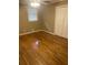 Bright bedroom with hardwood floors and closet at 4193 Dunmore Rd, Decatur, GA 30034