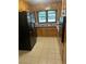 Kitchen with wood cabinets and tile floor at 4193 Dunmore Rd, Decatur, GA 30034
