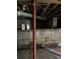 Unfinished basement with concrete floor and block walls at 4193 Dunmore Rd, Decatur, GA 30034