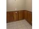 Small pantry with wood paneling at 4193 Dunmore Rd, Decatur, GA 30034