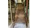 Unfinished basement with wooden staircase at 4193 Dunmore Rd, Decatur, GA 30034
