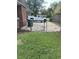 A long driveway with a chain link fence at 4193 Dunmore Rd, Decatur, GA 30034