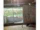 Unfinished basement with walkout access to backyard at 4193 Dunmore Rd, Decatur, GA 30034