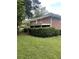 Brick house with a covered patio at 4193 Dunmore Rd, Decatur, GA 30034