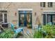 Private patio with blue chairs and access to the interior at 955 Juniper Ne St # 4027, Atlanta, GA 30309